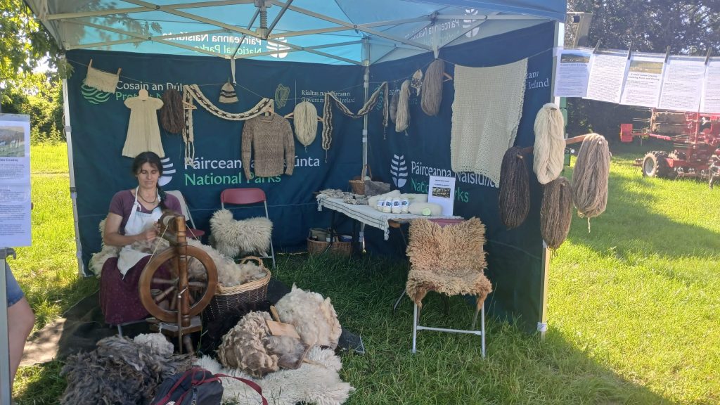 Interior photo of the tent showing cladoir wool, products, roving, etc